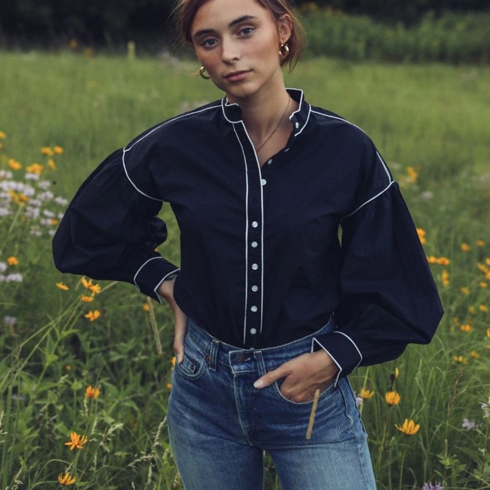 Elegant Black Blouse with White Trim